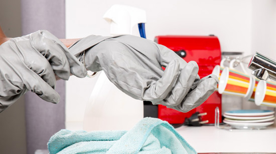 Carpet mold cleaning with protective clothing