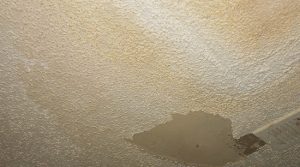Popcorn ceiling water damage removal and repair