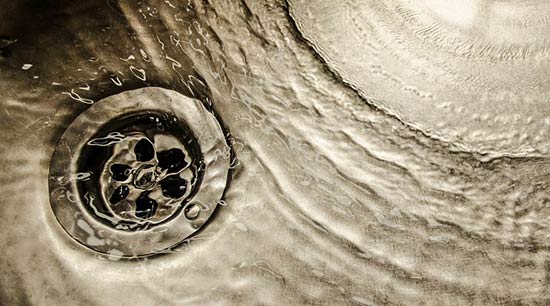 Unclogging slow or stopped drains is part of plumbing preventive maintenance