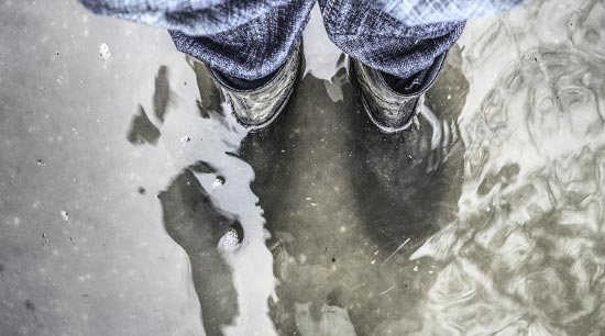 Floodwater rising threatening to flood homes